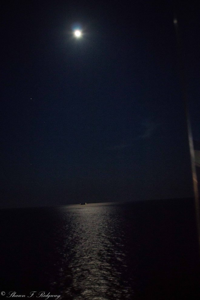 The moon on the water from the Sunset bar