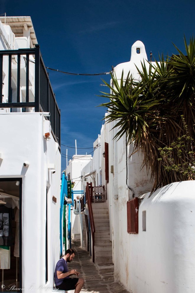 Alley with different colored porches in Hora