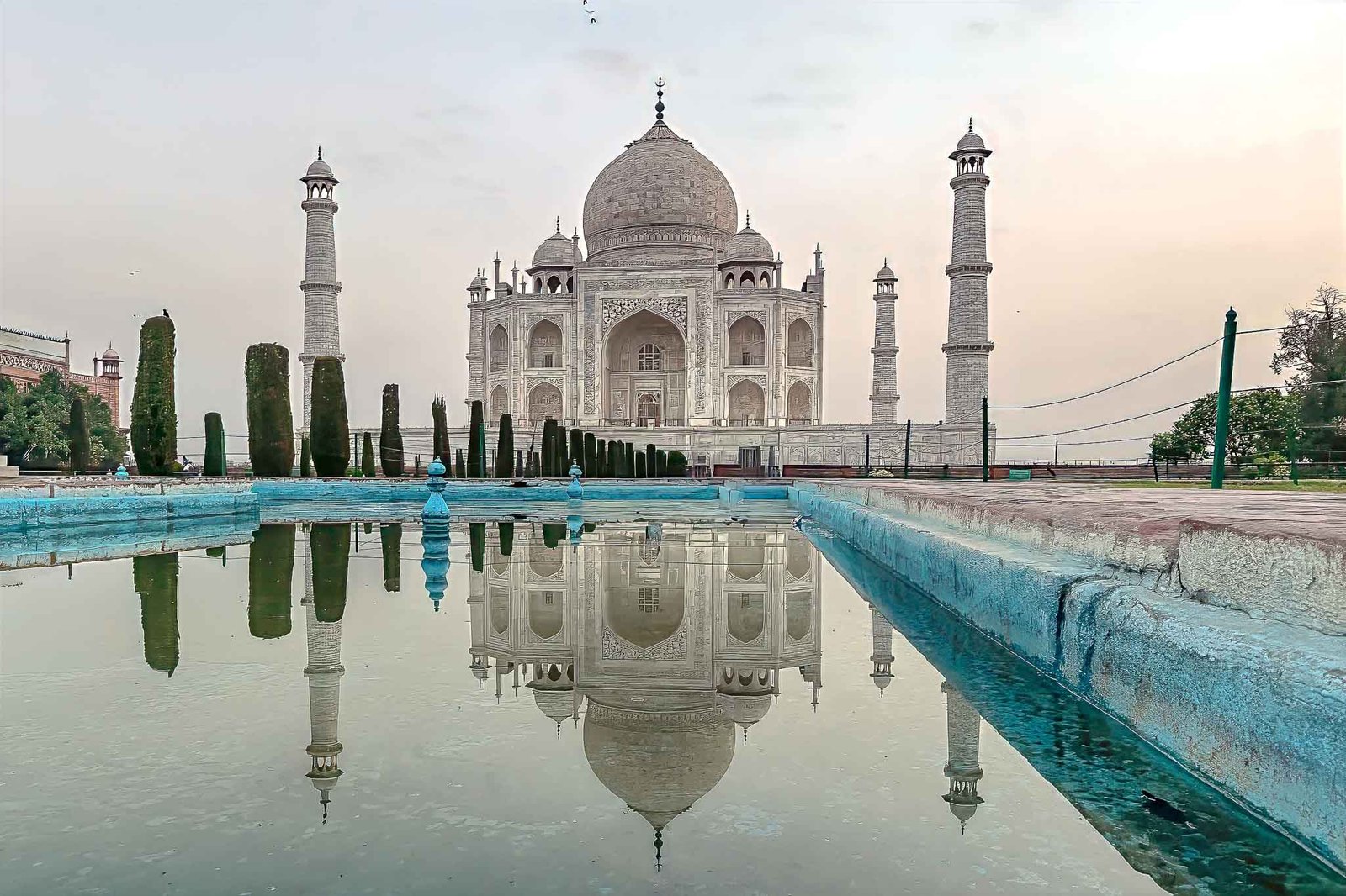 Taj Mahal views at Sunrise - the reflecting pools were empty but we found a puddle in one