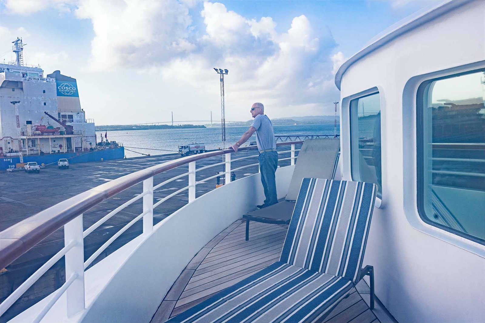 Conrad on the balcony as we were leaving the port