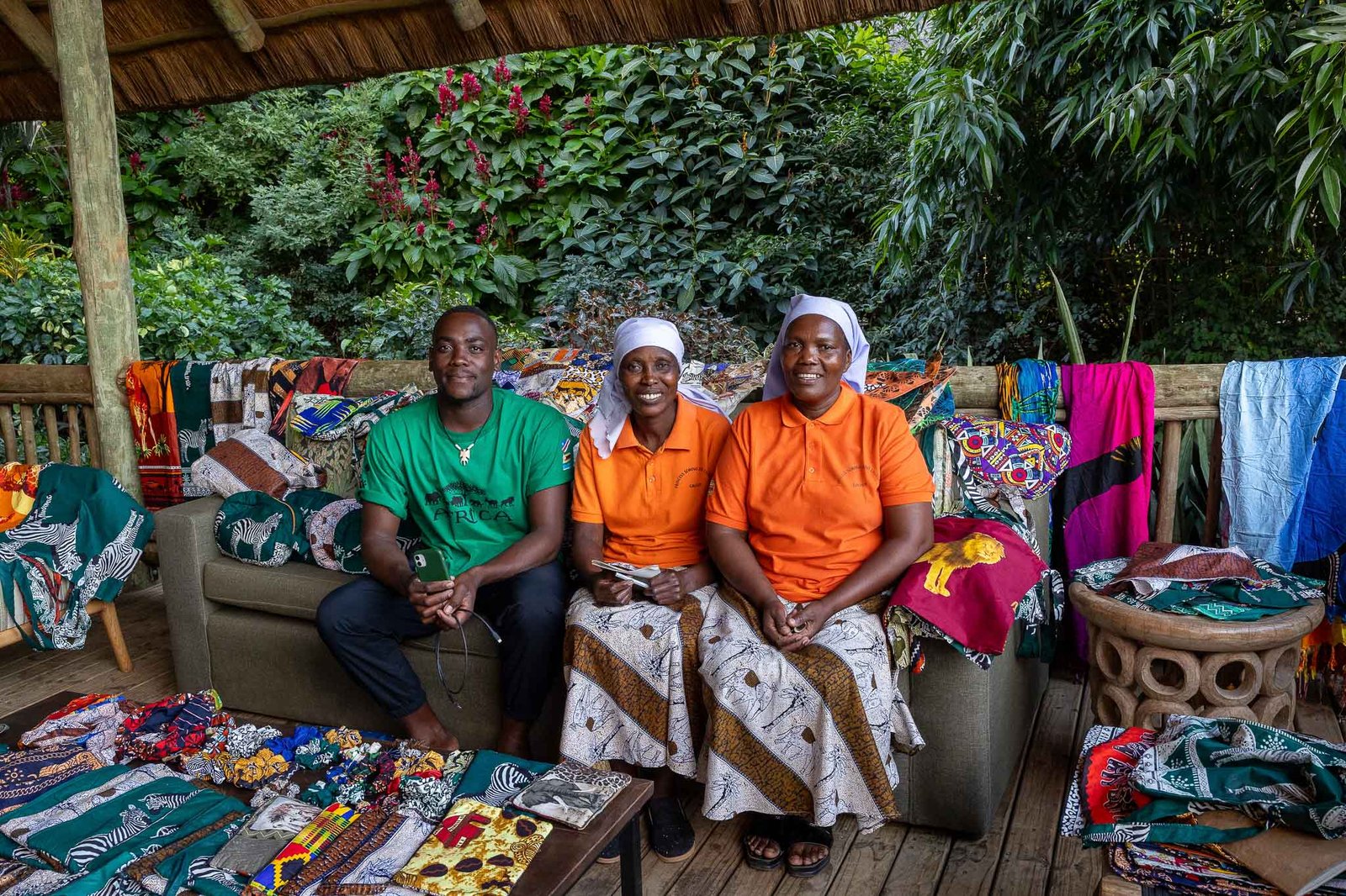 2 of the widows from the sewing project as well as the T-shirt man