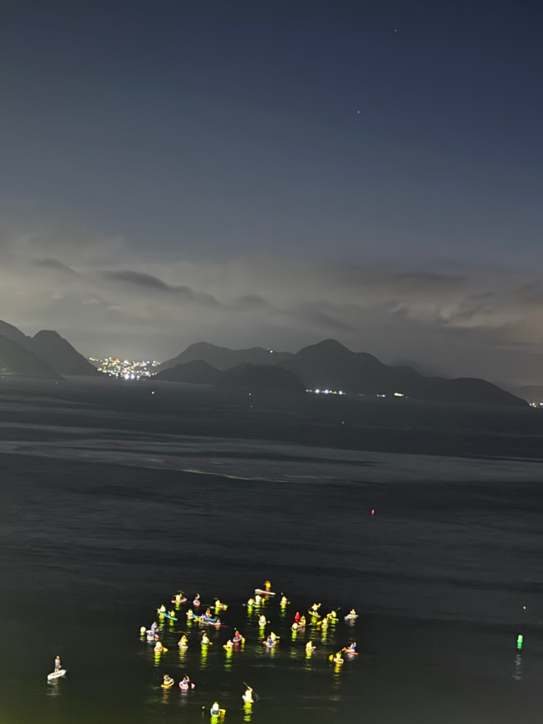 A few of the hundreds of Paddle boarders entering the water around 4:00 AM at Copacabana beach