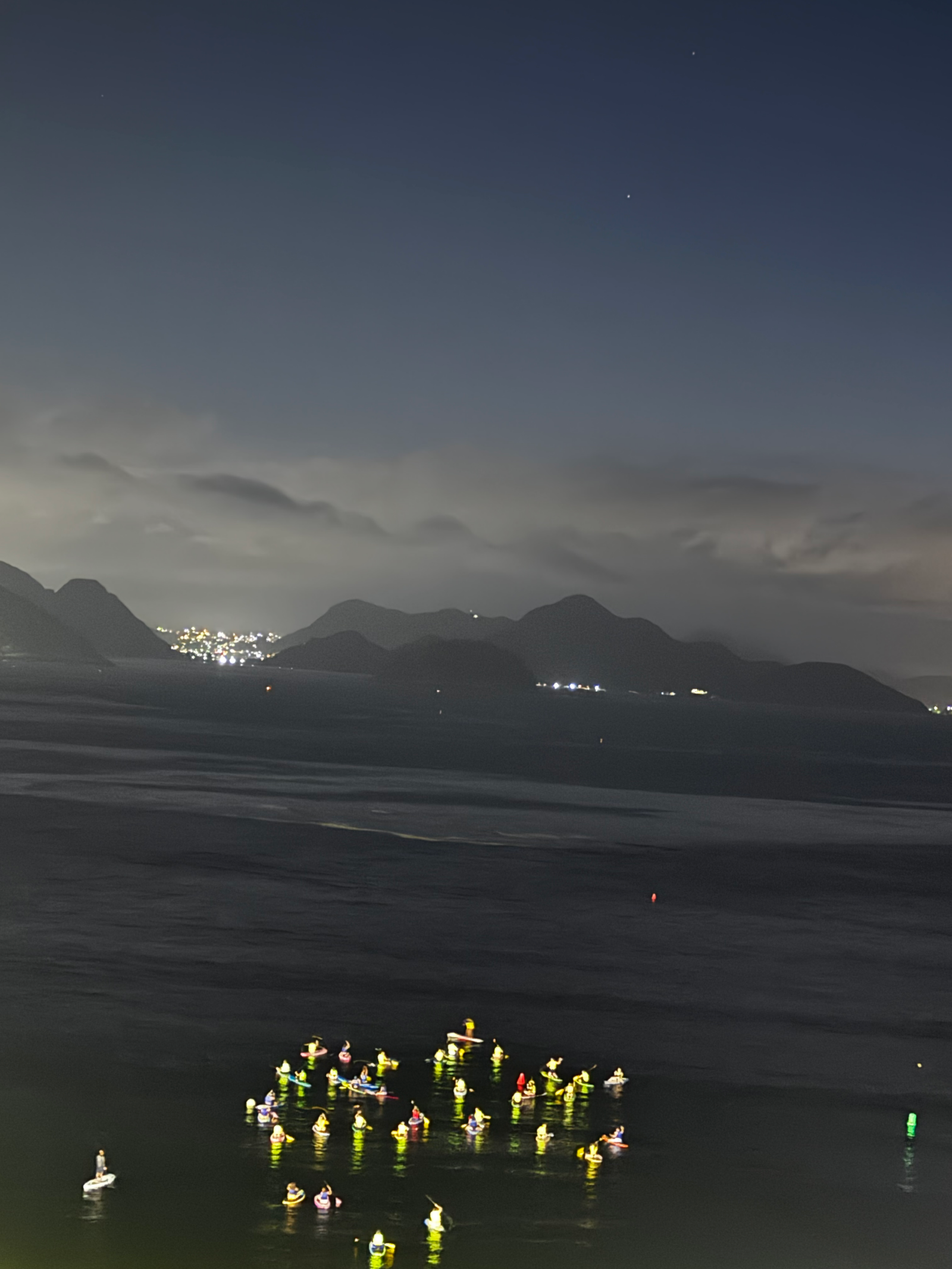 A few of the hundreds of Paddle boarders entering the water around 4:00 AM at Copacabana beach