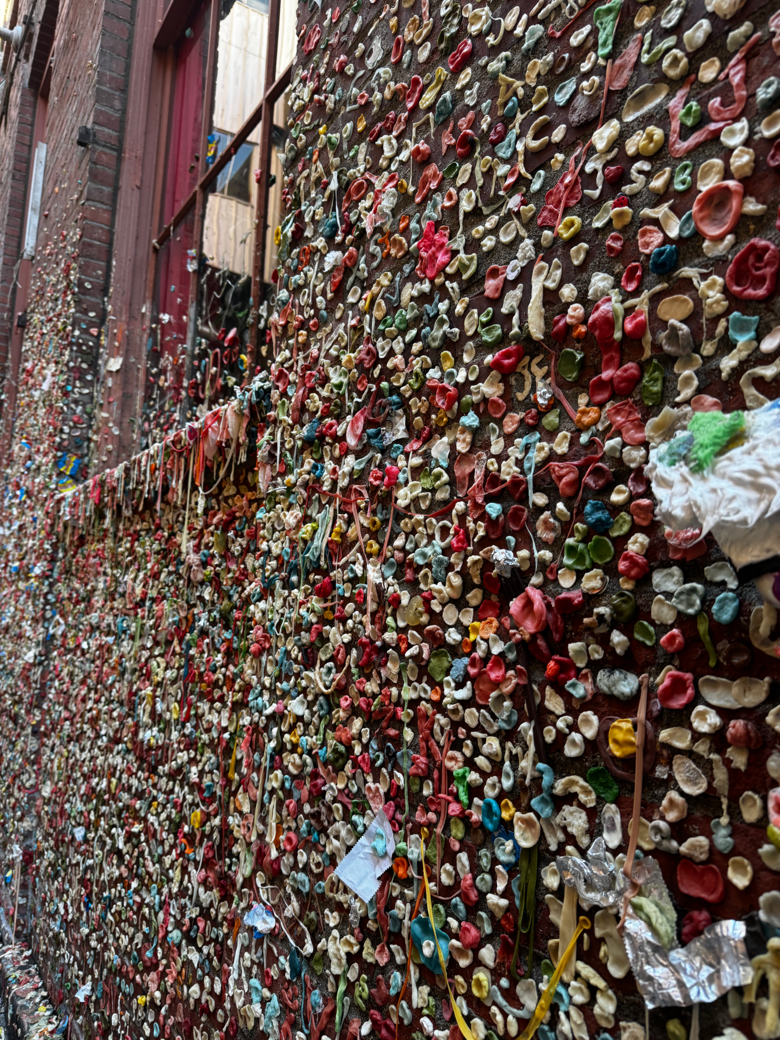 Gum on a wall in an alley on the way down to the waterfront