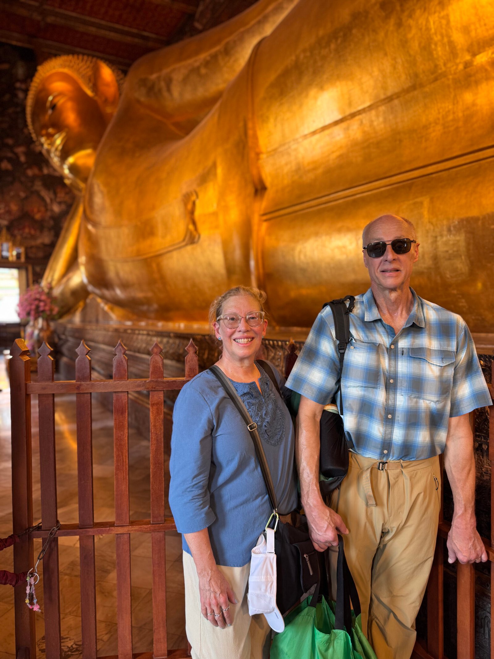 Shawn and Conrad in front of the reclining Buddha