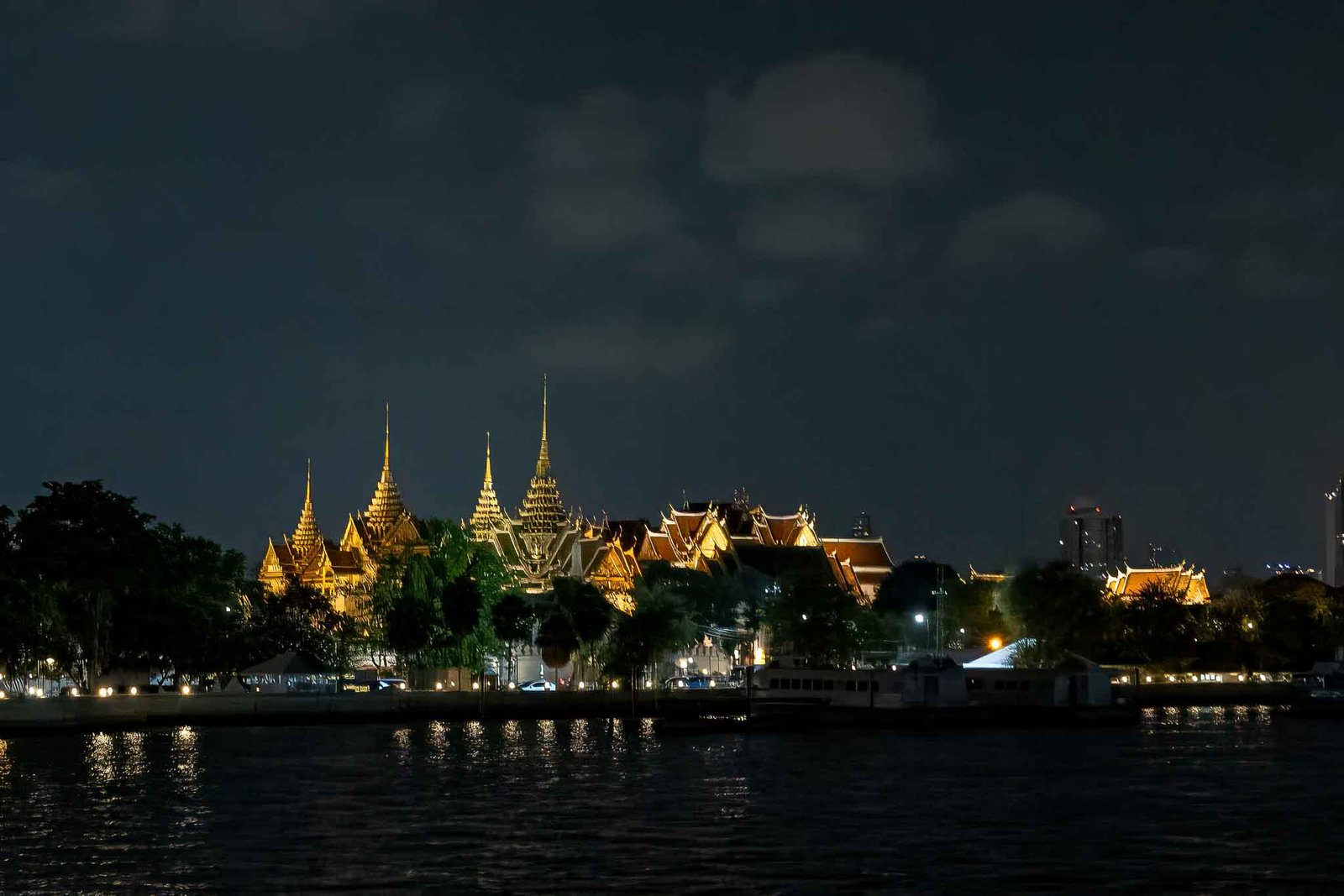 Grand Palace in the distance and the roof of Wat Pho on theright