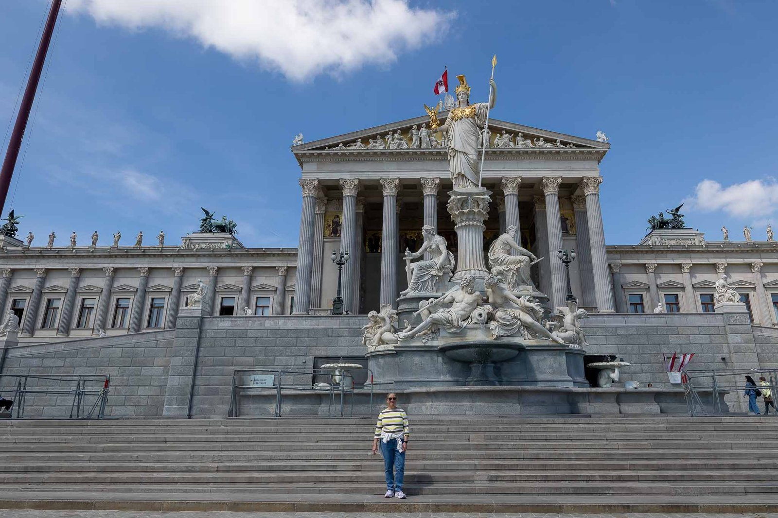 Shawn in front of the statue of Athena in front of Parliament