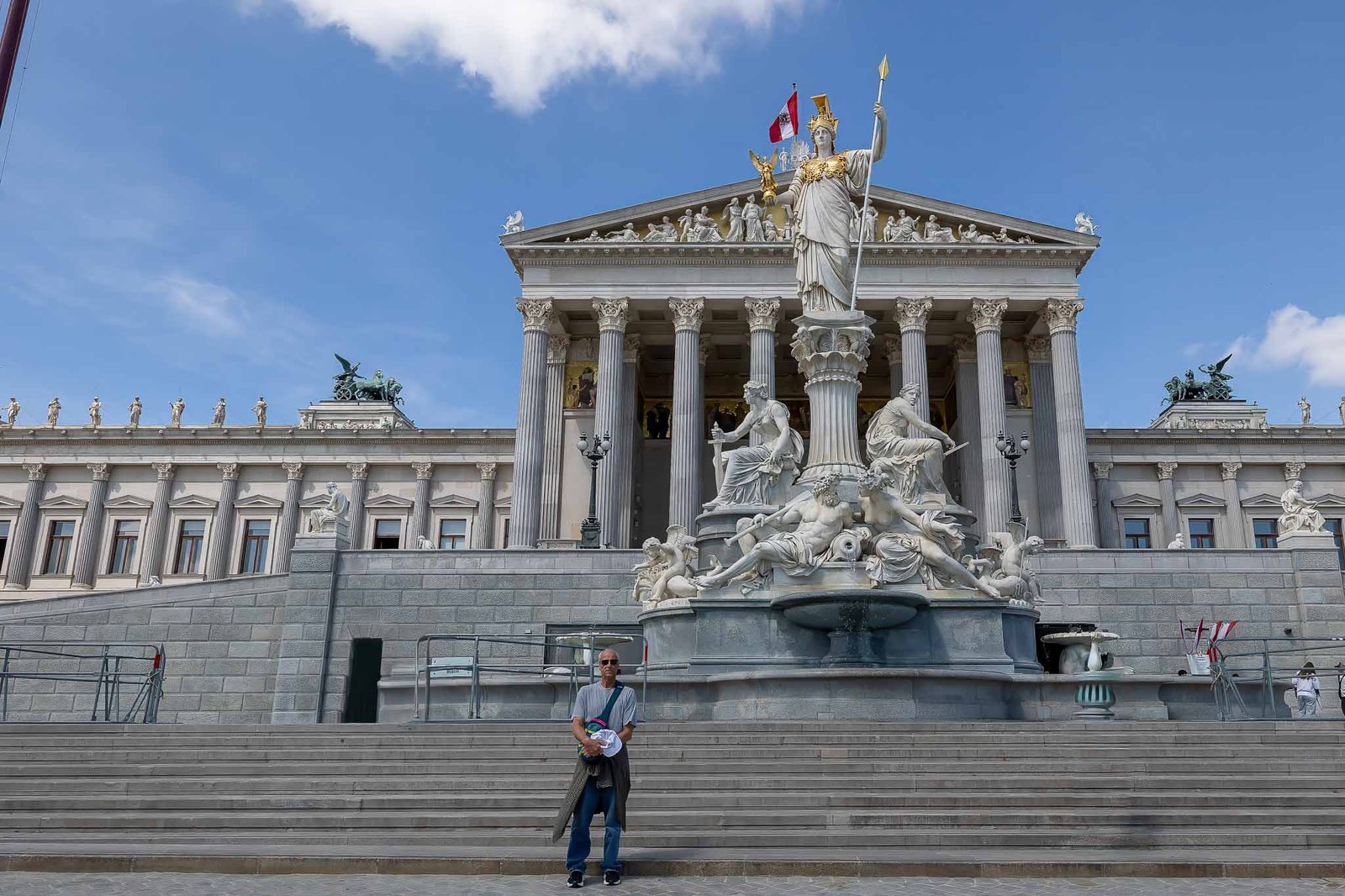 Conrad in front of the statue of Athena in front of Parliament