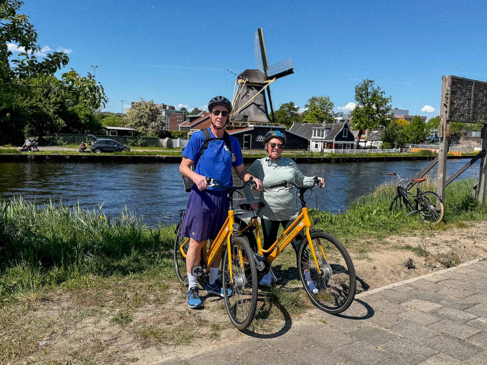 Mid-bike ride with a historical windmill in the background